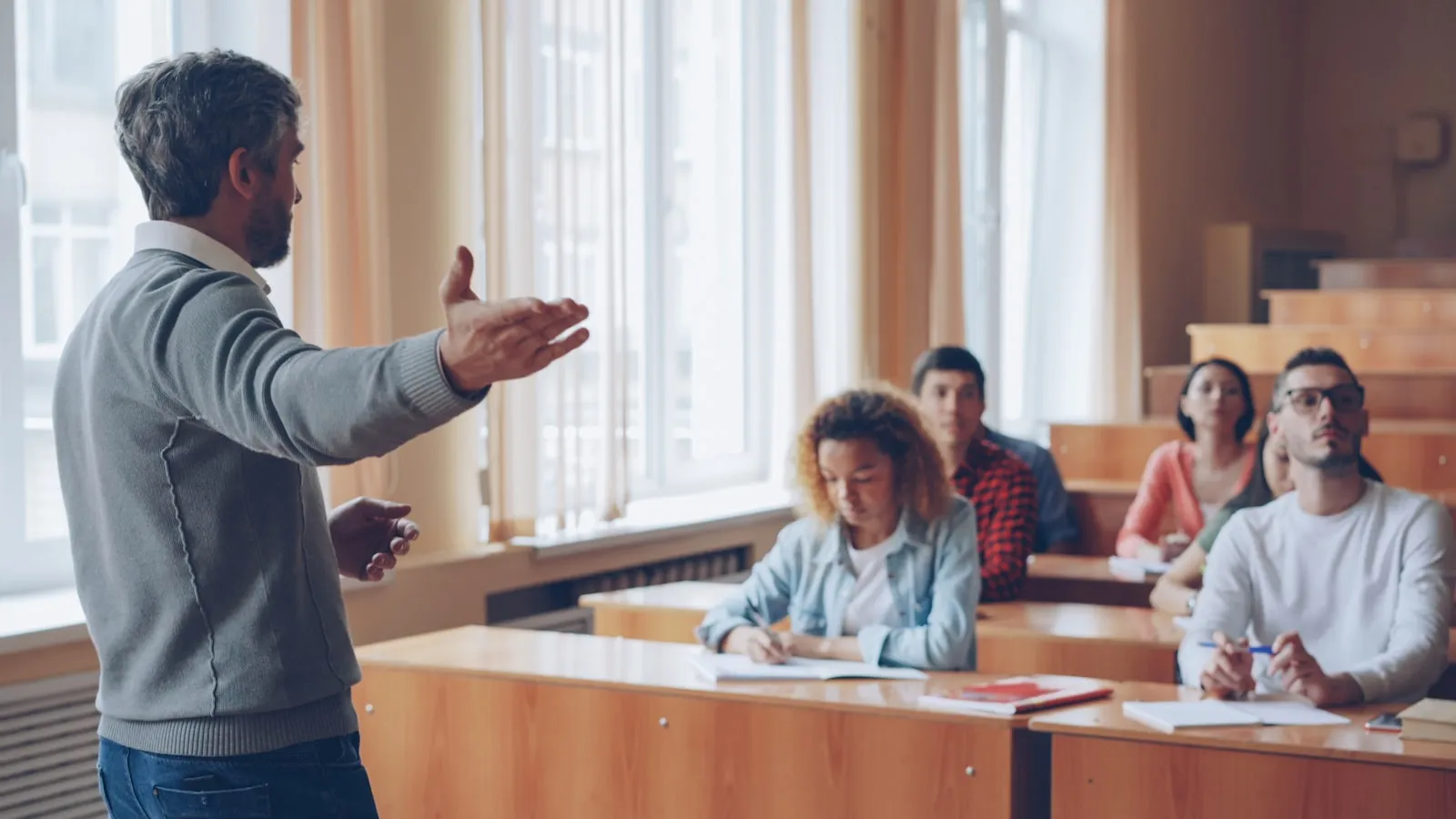 A leadership lecture in session — one facilitator, one idea, 45 minutes